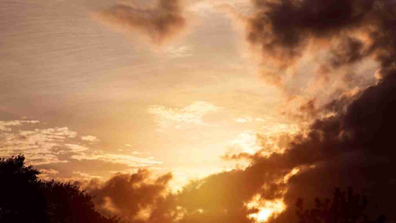 Golden sunset with soft pink and orange hues