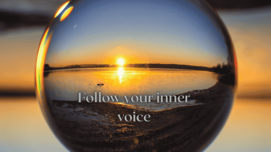 Glass sphere showing a peaceful sea sunset reflecting the idea that follow your inner voice