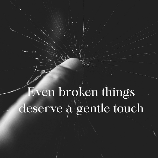 Finger on shattered glass